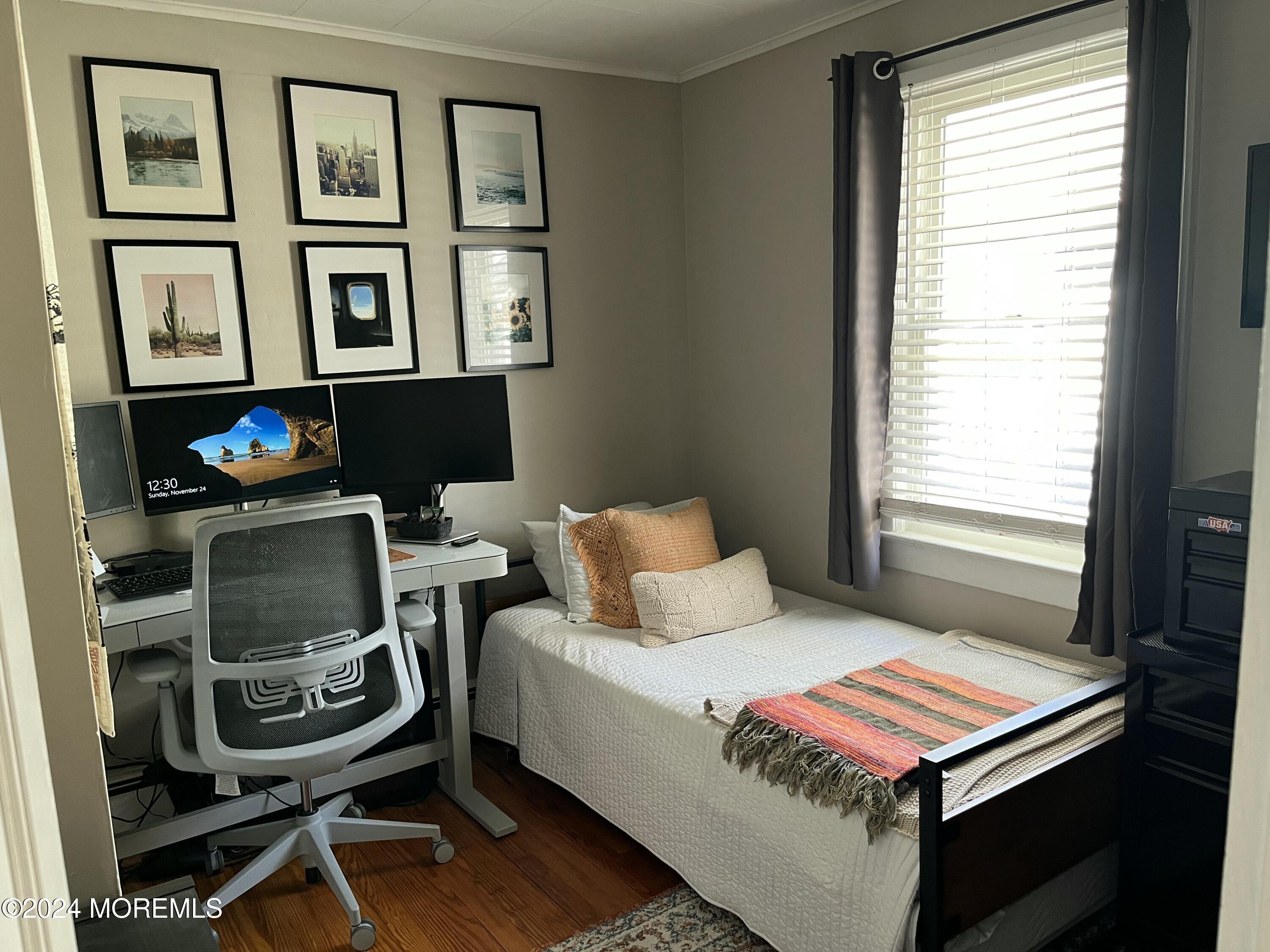 1236 Maplewood Road Belmar, NJ 07719 - Photo 26 of 38 a bedroom with a bed a computer on a desk and chair