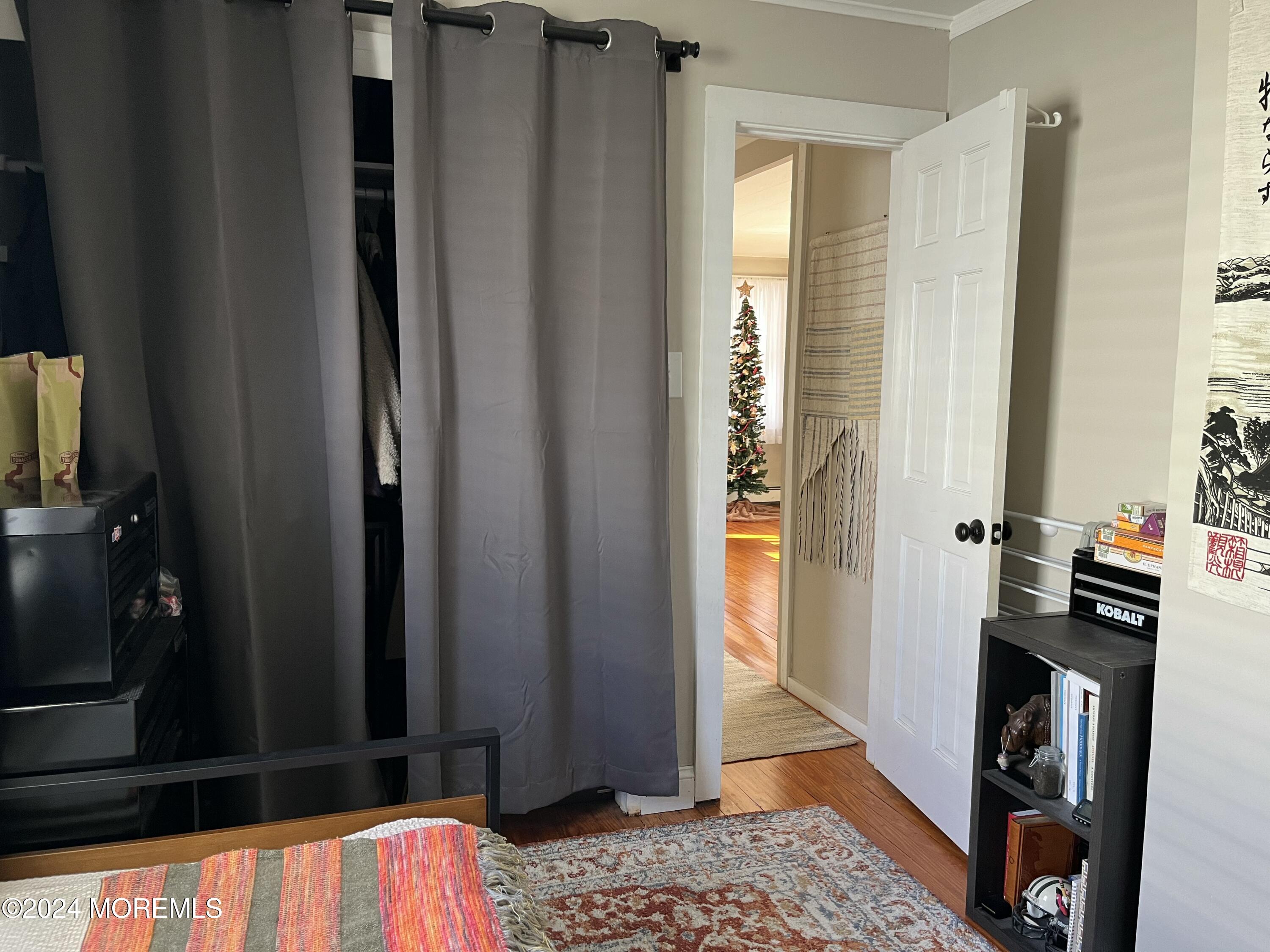 1236 Maplewood Road Belmar, NJ 07719 - Photo 27 of 38 a view of walk in closet with clothes and shoes