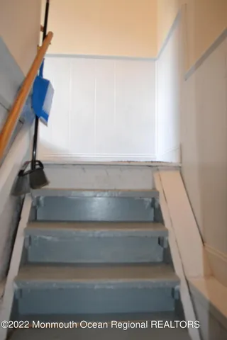 a utility room with sink dryer and washer