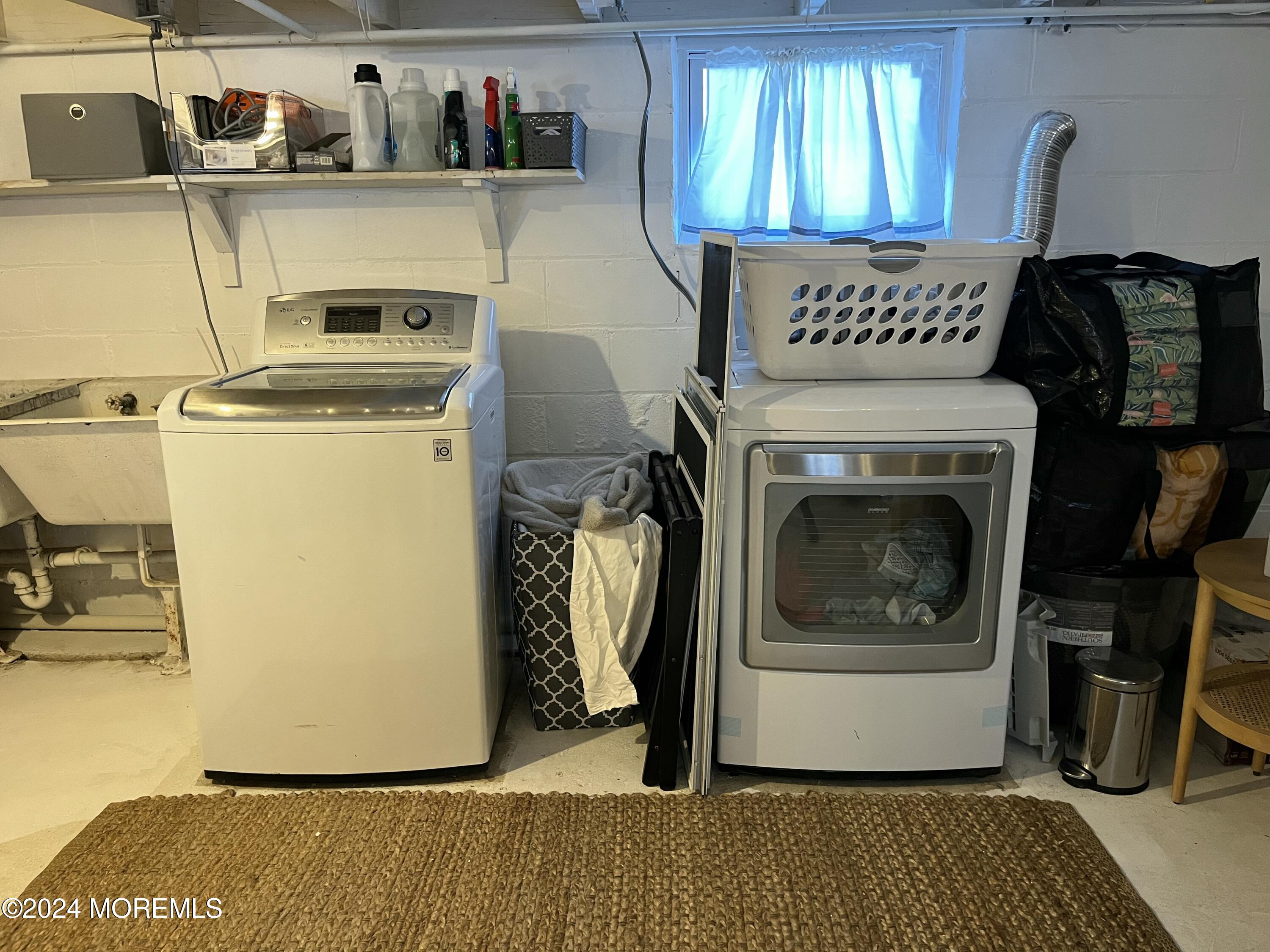 1236 Maplewood Road Belmar, NJ 07719 - Photo 29 of 38 a utility room with sink dryer and washer
