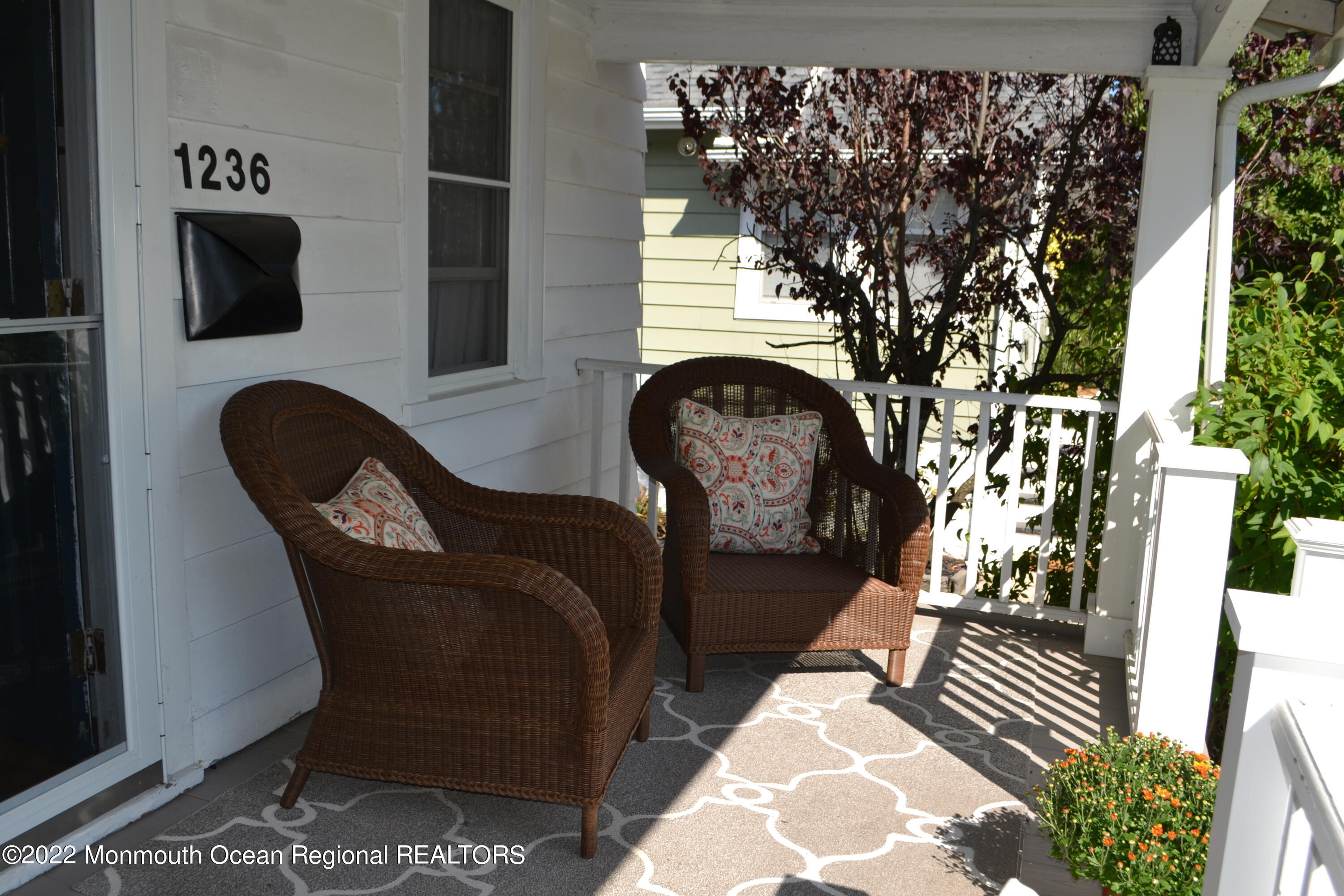 1236 Maplewood Road Belmar, NJ 07719 - Photo 6 of 38 a living room with furniture and a fireplace