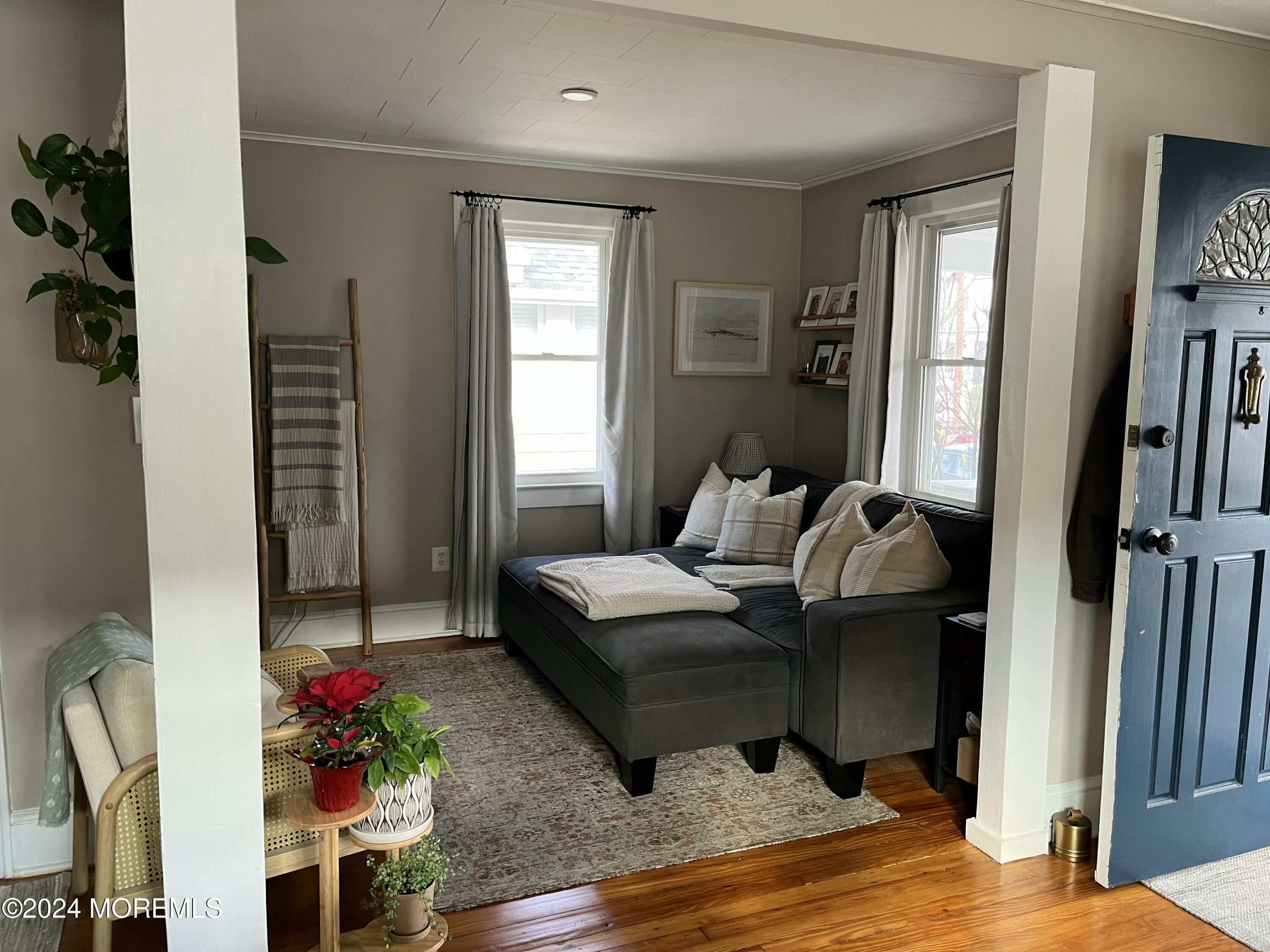 1236 Maplewood Road Belmar, NJ 07719 - Photo 10 of 38 a living room with furniture window and wooden floor