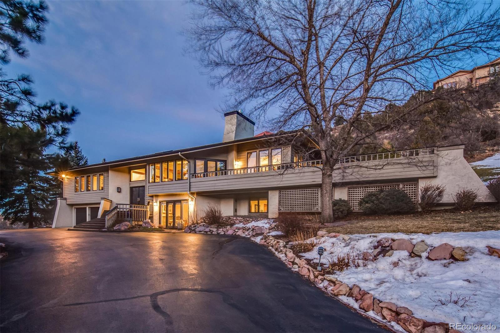 5852 Willowbrook Drive Morrison, CO 80465 - Photo 1 of 30 a view of a house with a yard