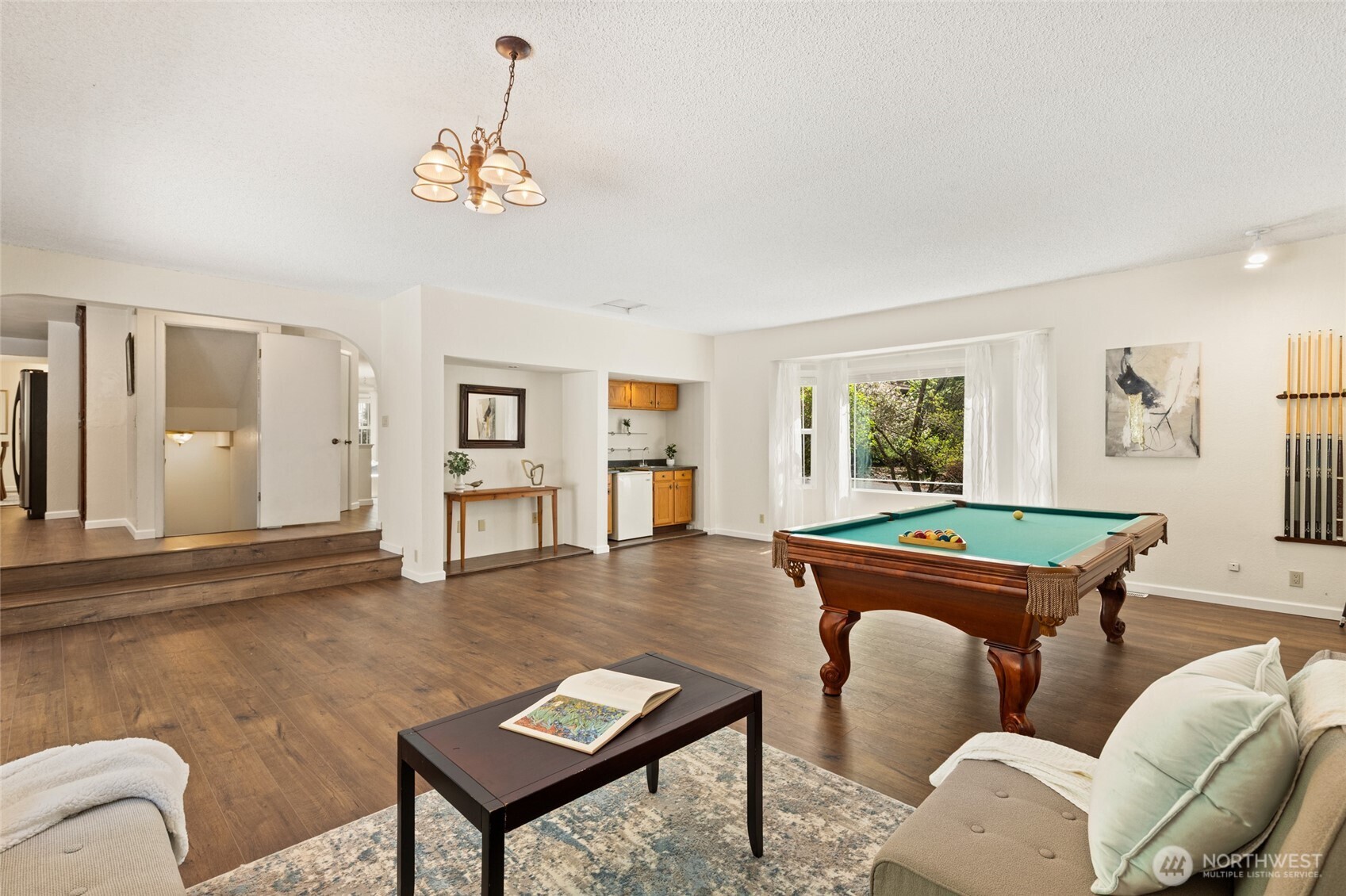 20817 29th Avenue Southeast Bothell, WA 98021 - Photo 15 of 40 a living room with furniture and a table