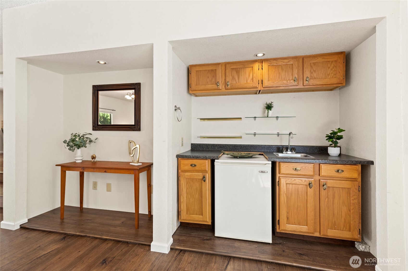 20817 29th Avenue Southeast Bothell, WA 98021 - Photo 16 of 40 a kitchen with stainless steel appliances granite countertop a sink and cabinets