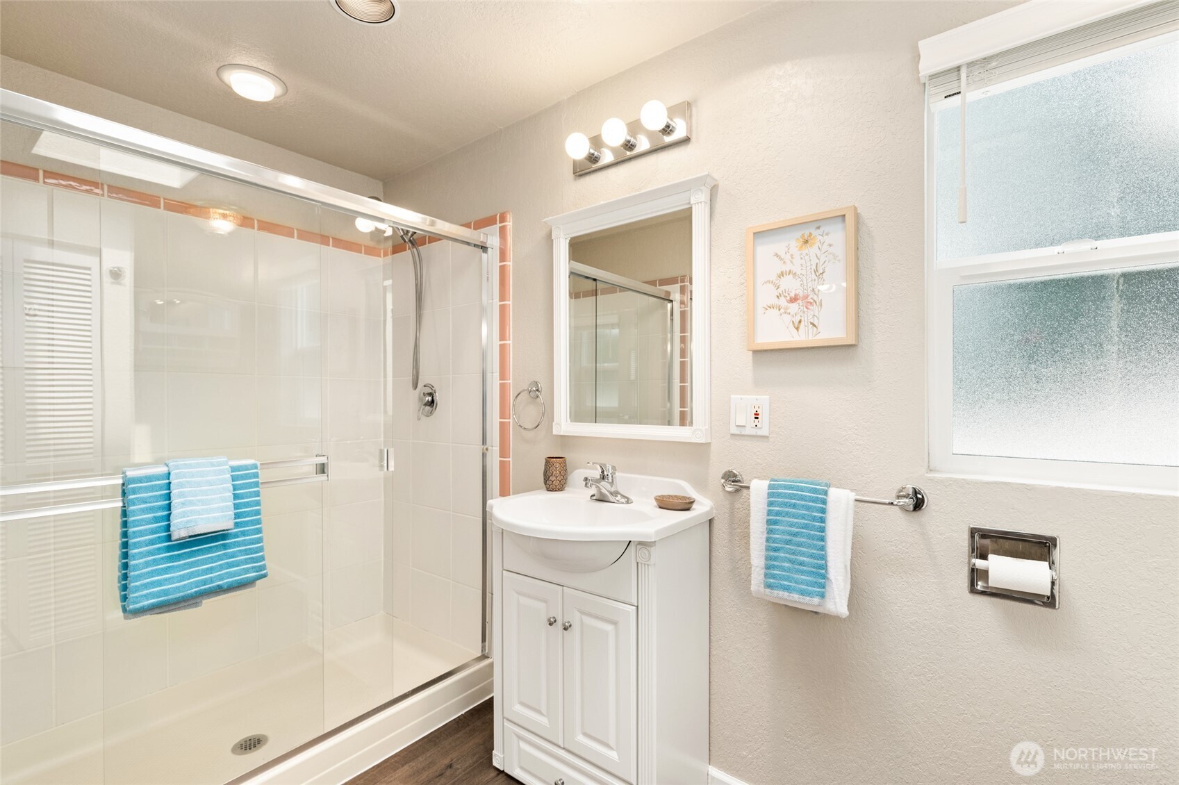 20817 29th Avenue Southeast Bothell, WA 98021 - Photo 24 of 40 a bathroom with a sink vanity and mirror