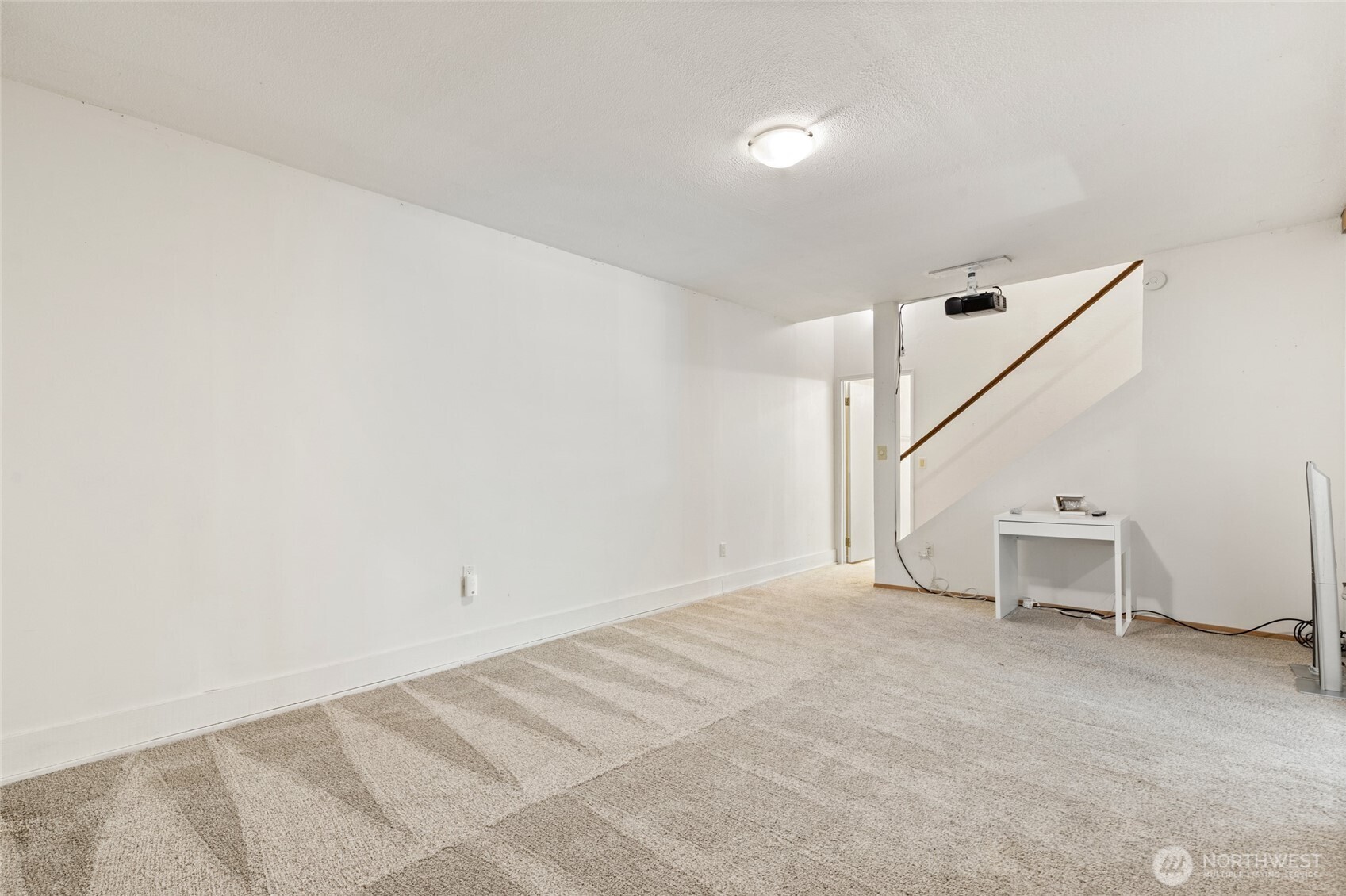 20817 29th Avenue Southeast Bothell, WA 98021 - Photo 31 of 40 a view of an empty room with stairs