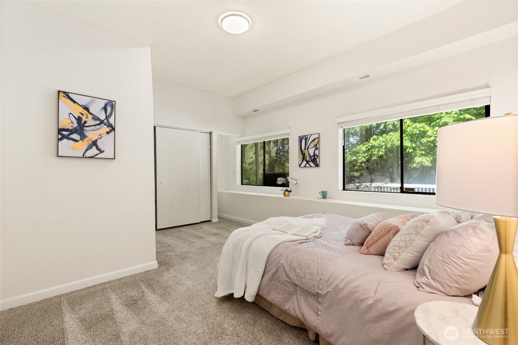 20817 29th Avenue Southeast Bothell, WA 98021 - Photo 32 of 40 a bedroom with a bed and a window