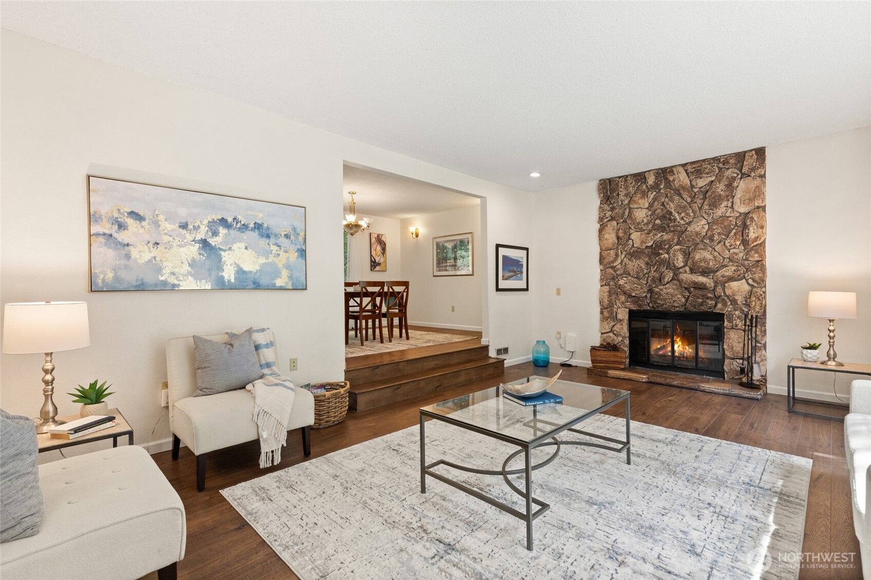20817 29th Avenue Southeast Bothell, WA 98021 - Photo 6 of 40 a living room with furniture and a fireplace