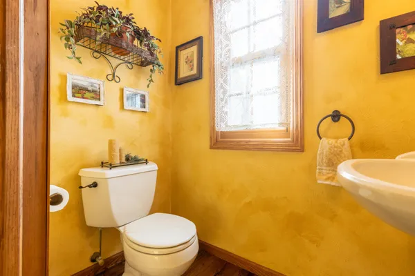 a bathroom with a tub and a sink