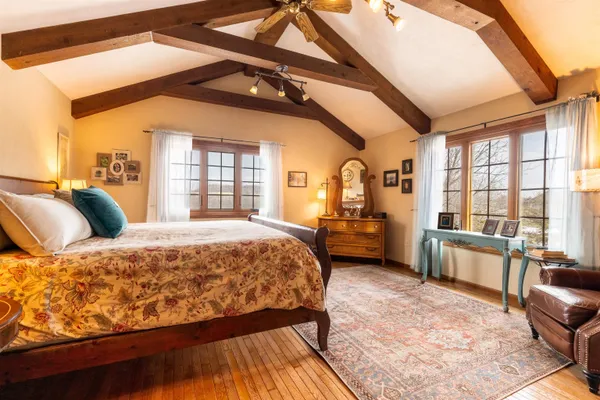 a bathroom with a shower and a mirror