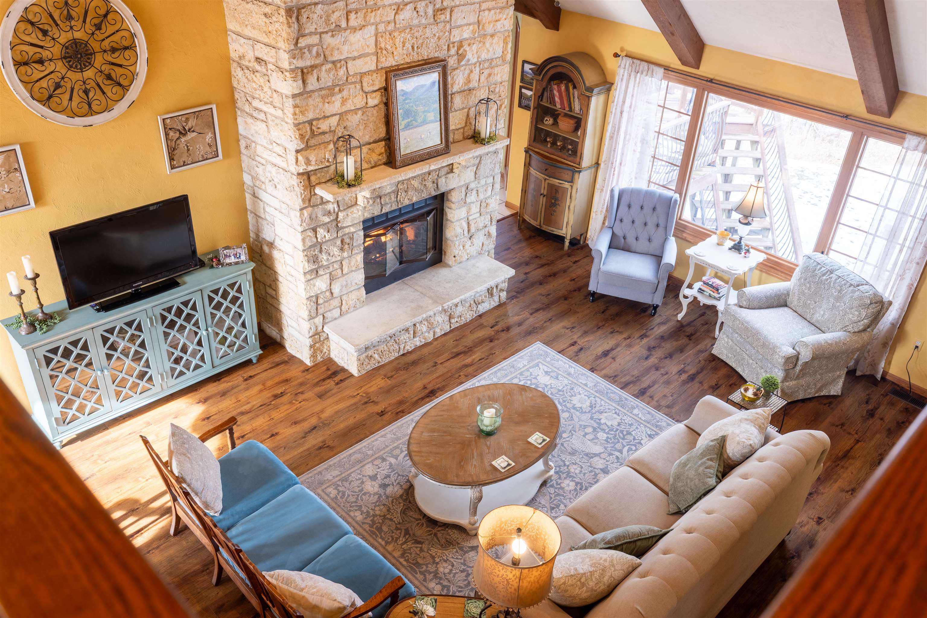 24 Butternut Lane Galena, IL 61036 - Photo 27 of 61 a living room with furniture a flat screen tv and a fireplace