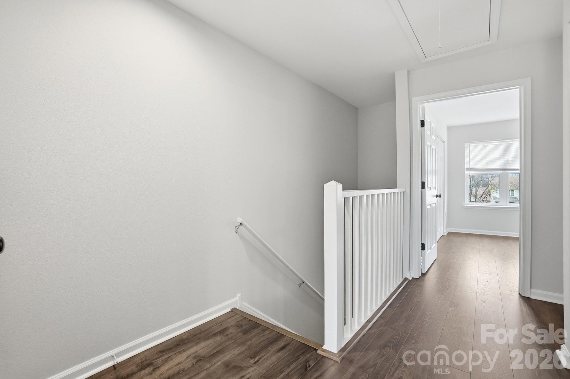 711 Stone Village Drive Fort Mill, SC 29708 - Photo 25 of 46 a view of a hallway with wooden floor and entryway