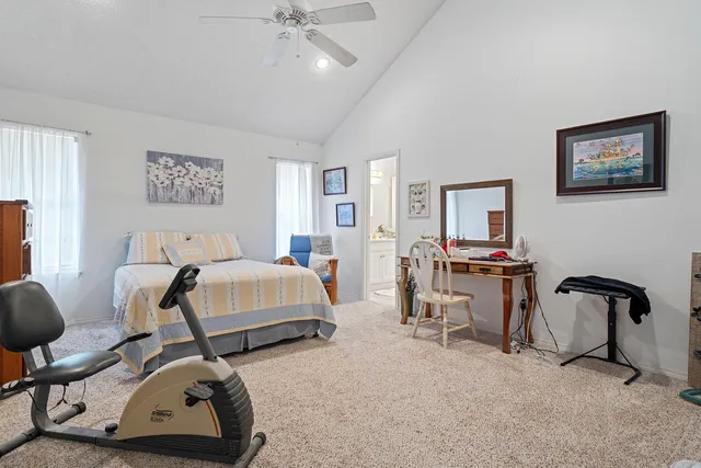 a room with furniture and a chair