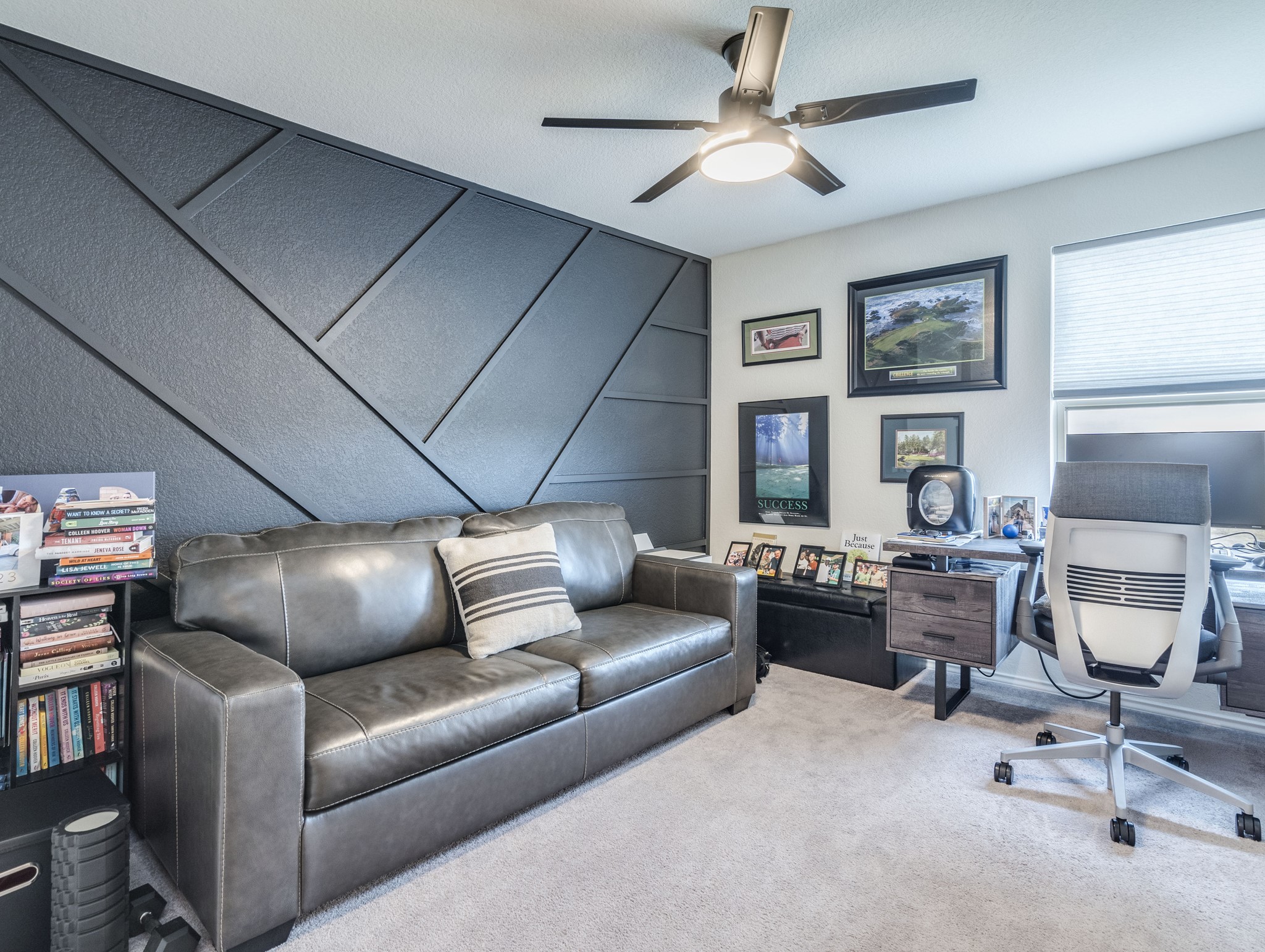 624 Pepperbark Loop Buda, TX 78610 - Photo 13 of 32 a living room with furniture ceiling fan and a window