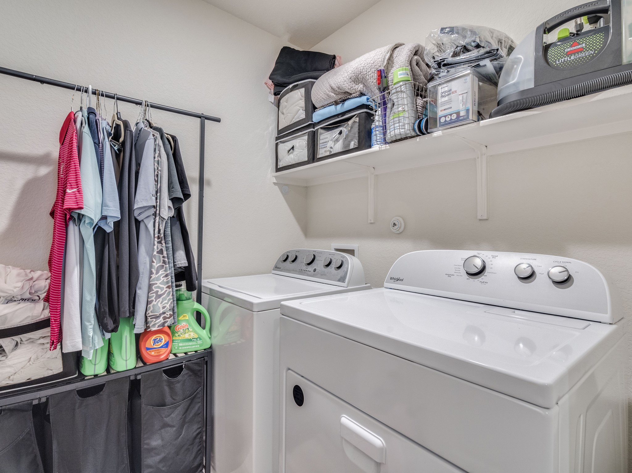 624 Pepperbark Loop Buda, TX 78610 - Photo 23 of 32 a utility room with dryer and washer