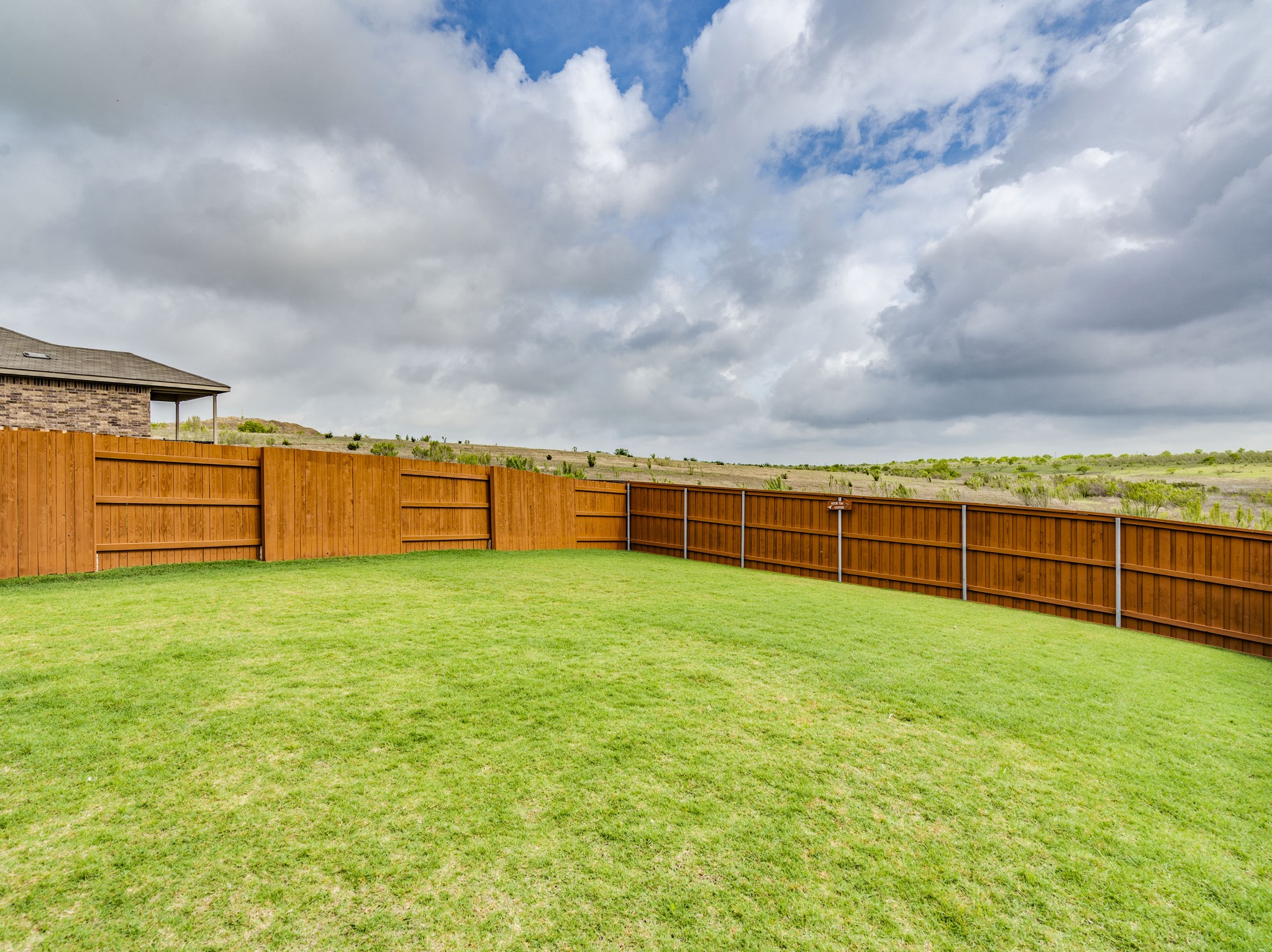 624 Pepperbark Loop Buda, TX 78610 - Photo 28 of 32 a view of an outdoor space and a yard