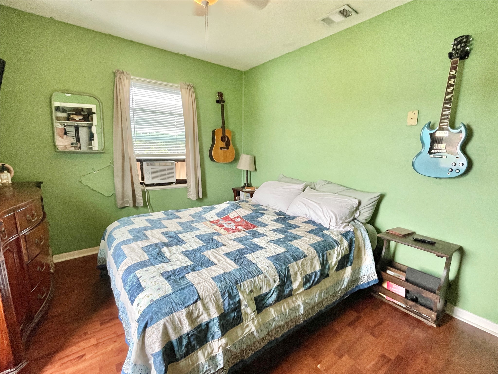 136 Fm 2239 Road Paige, TX 78659 - Photo 9 of 29 a bedroom with a bed chair and window