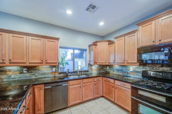 a view of a workspace with furniture and a livingroom