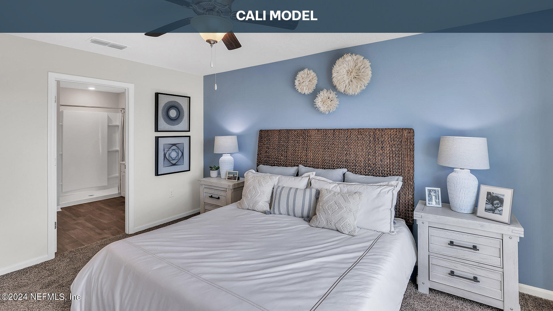 561 Orellana Road St. Augustine, FL 32084 - Photo 16 of 65 a bedroom with a bed and a lamp