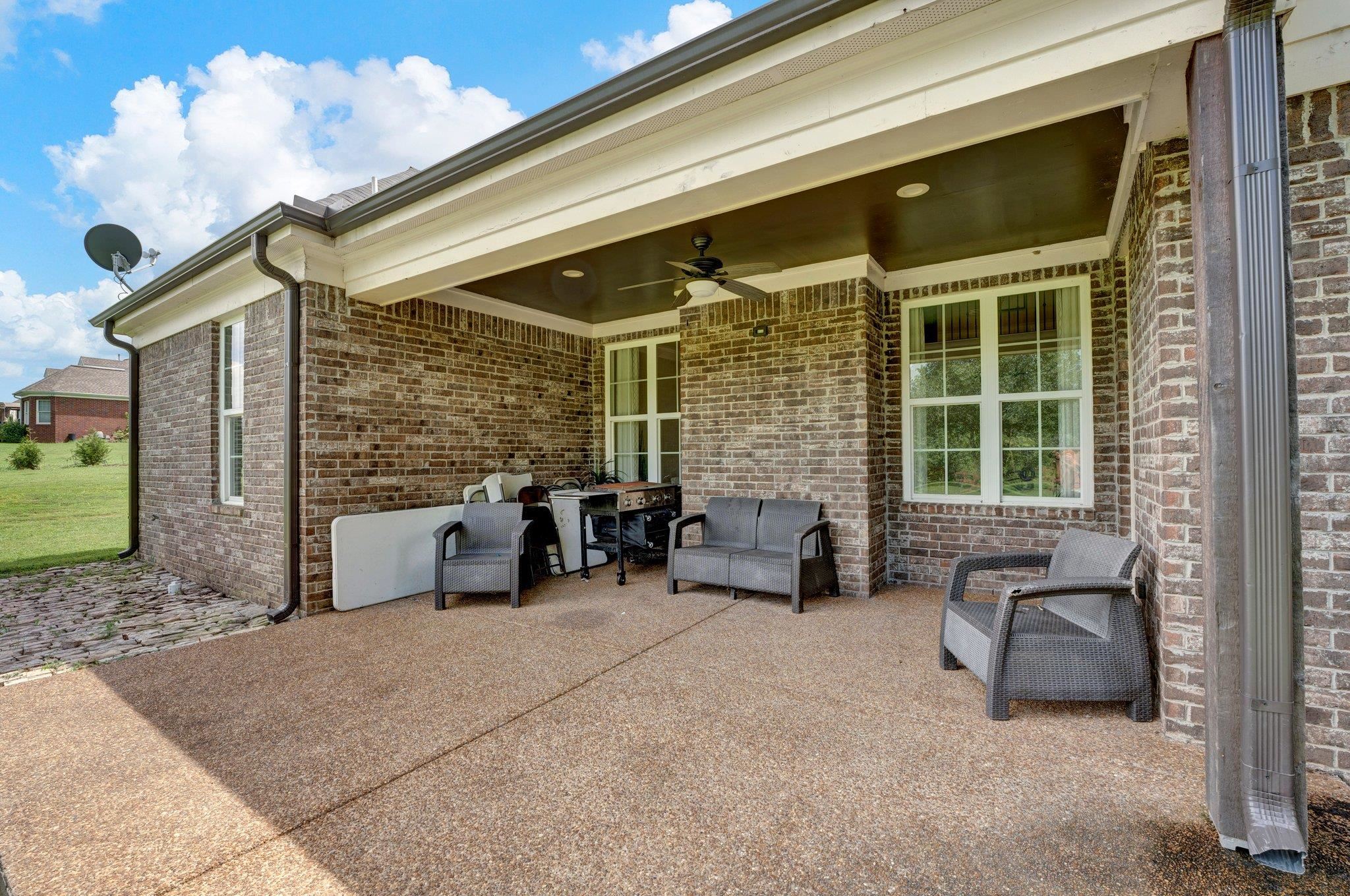 3270 Rast Road Millington, TN 38053 - Photo 35 of 40 View of patio with a ceiling fan and outdoor lounge area