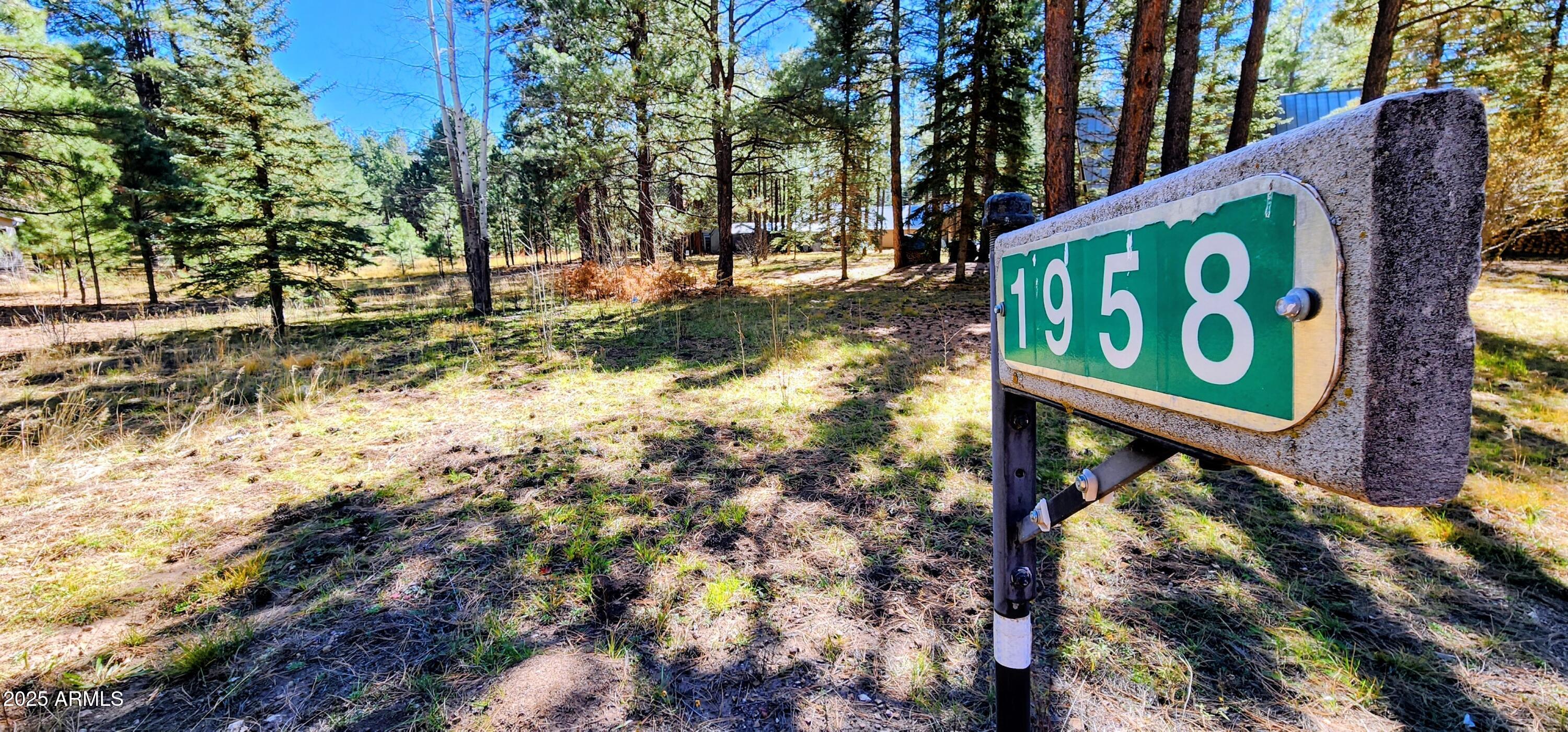 1958 Ferret Circle, Unit 260 Forest Lakes, AZ 85931 - Photo 6 of 7 a view of street sign