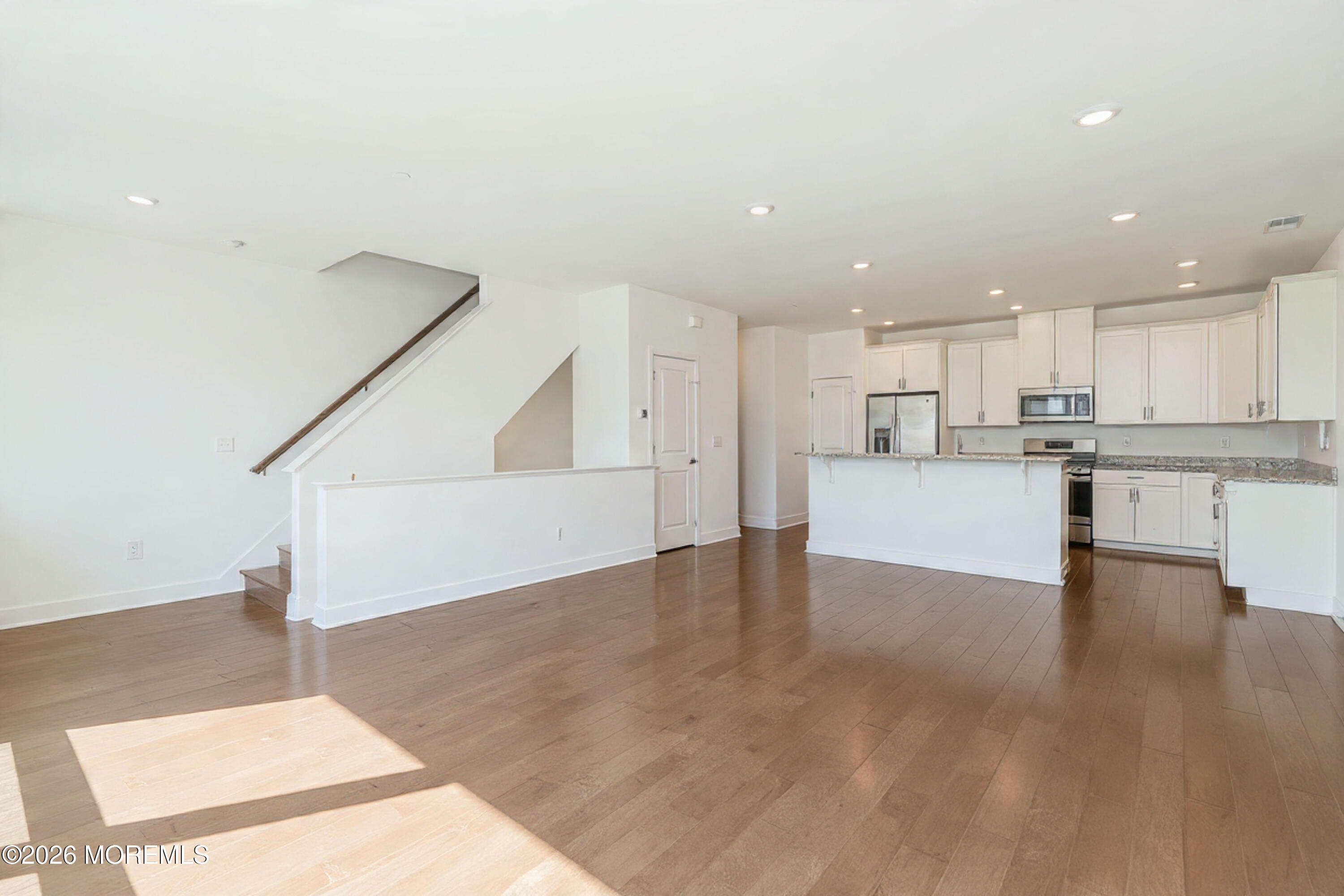 37 Midway Road North Tinton Falls, NJ 07724 - Photo 11 of 46 a view of kitchen with wooden floor