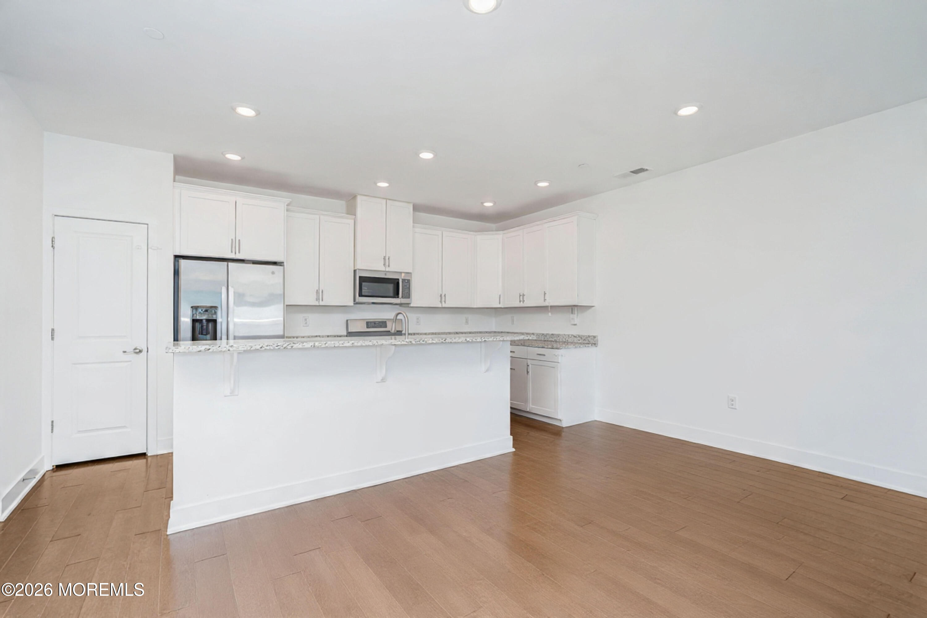 37 Midway Road North Tinton Falls, NJ 07724 - Photo 13 of 46 a view of kitchen with wooden floor