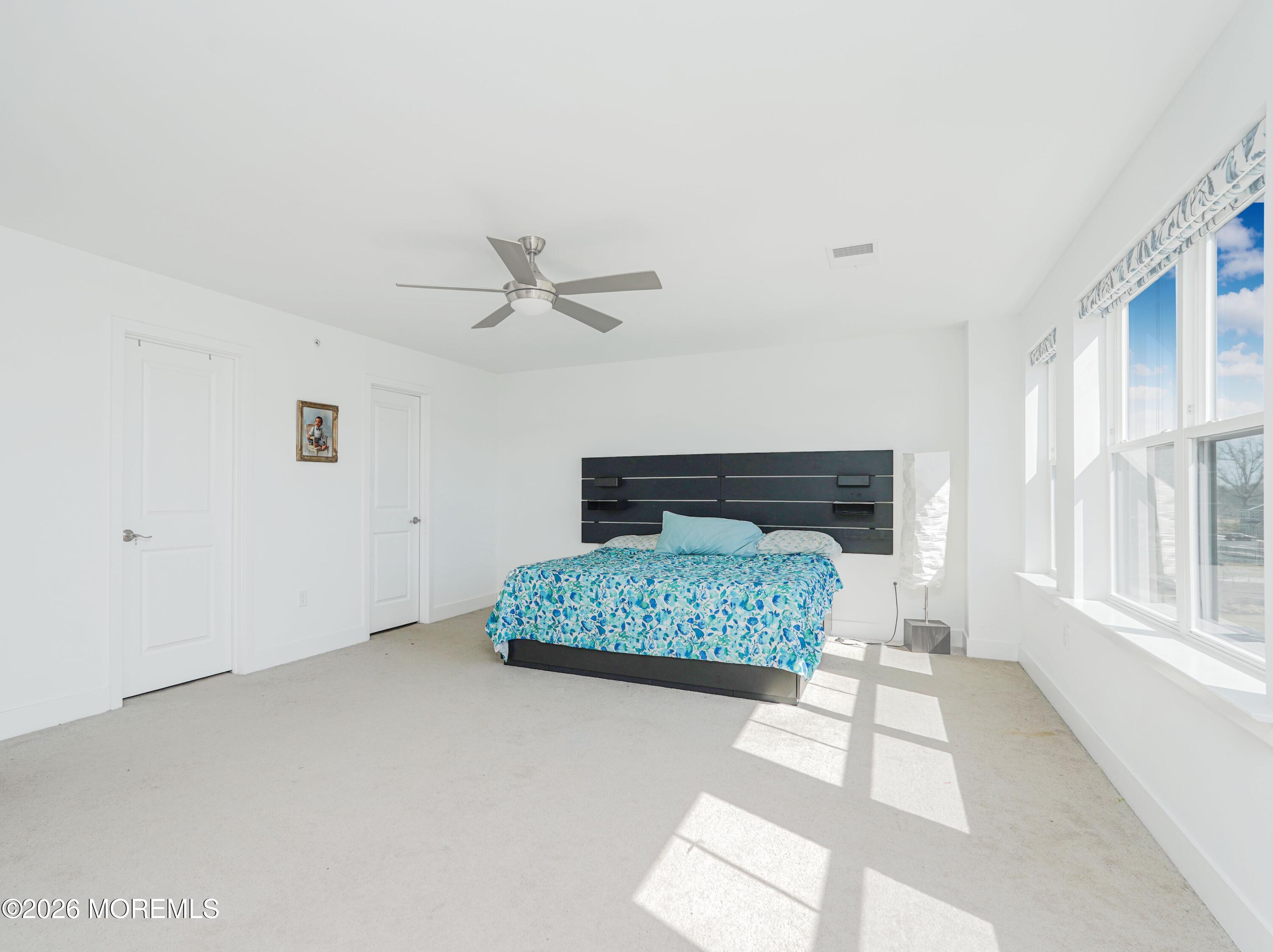 37 Midway Road North Tinton Falls, NJ 07724 - Photo 25 of 46 a living room with a fireplace furniture a rug and a window