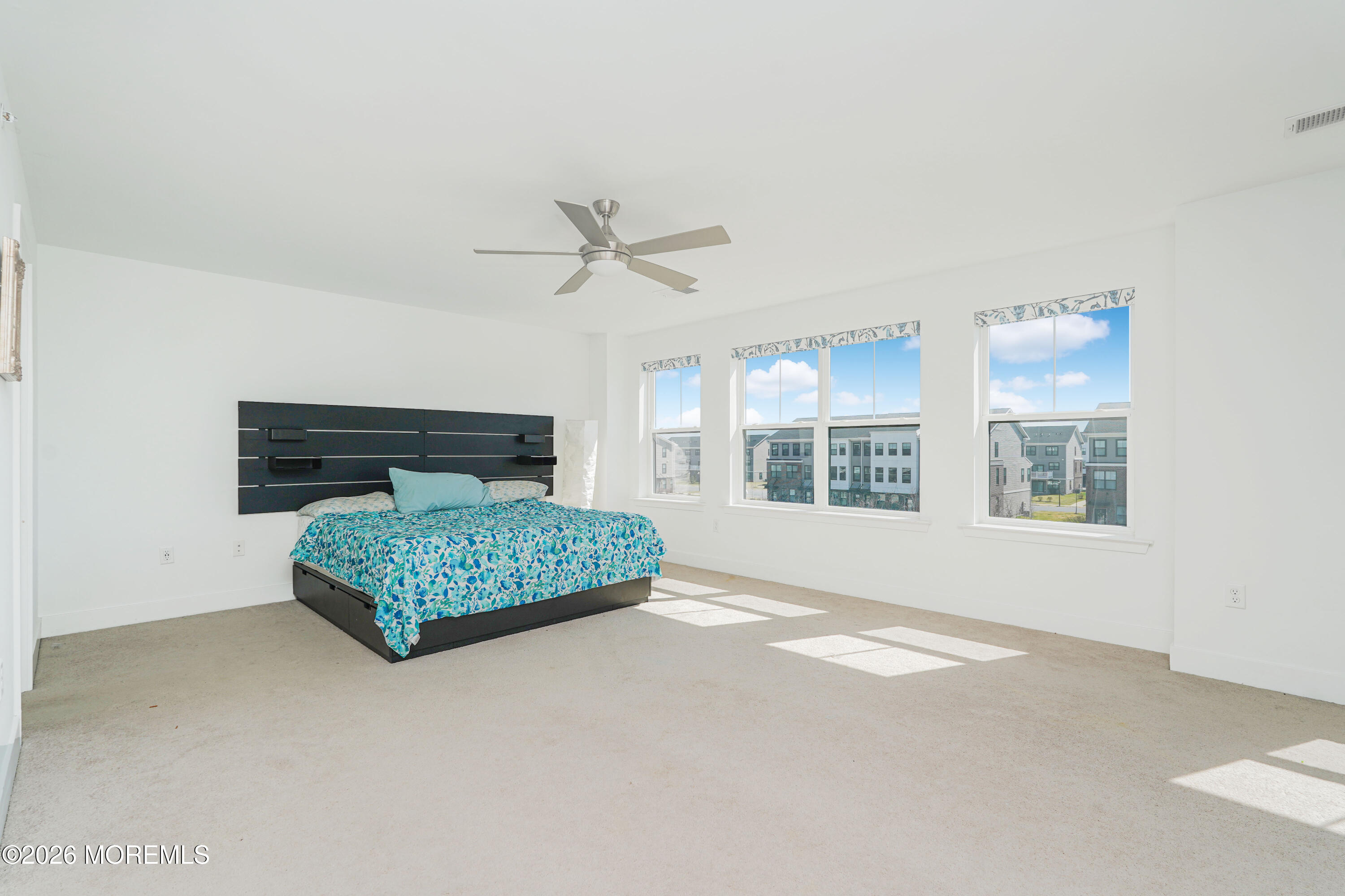 37 Midway Road North Tinton Falls, NJ 07724 - Photo 26 of 46 a bedroom with a bed a window and ceiling fan