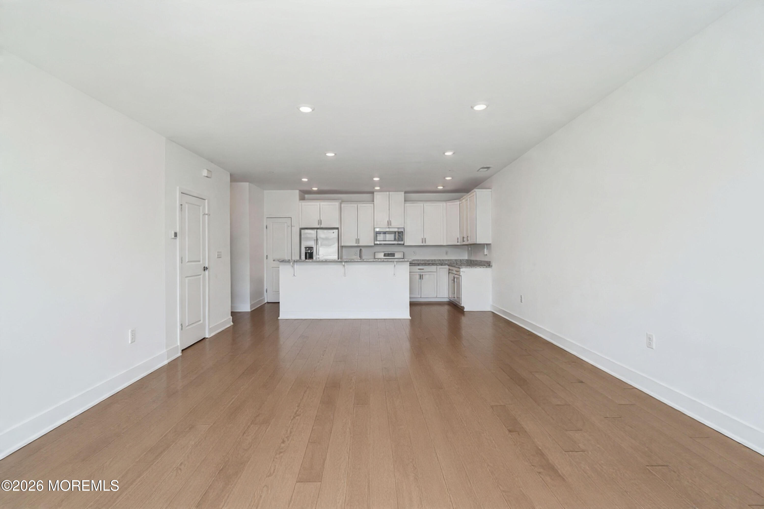 37 Midway Road North Tinton Falls, NJ 07724 - Photo 8 of 46 a view of kitchen with wooden floor