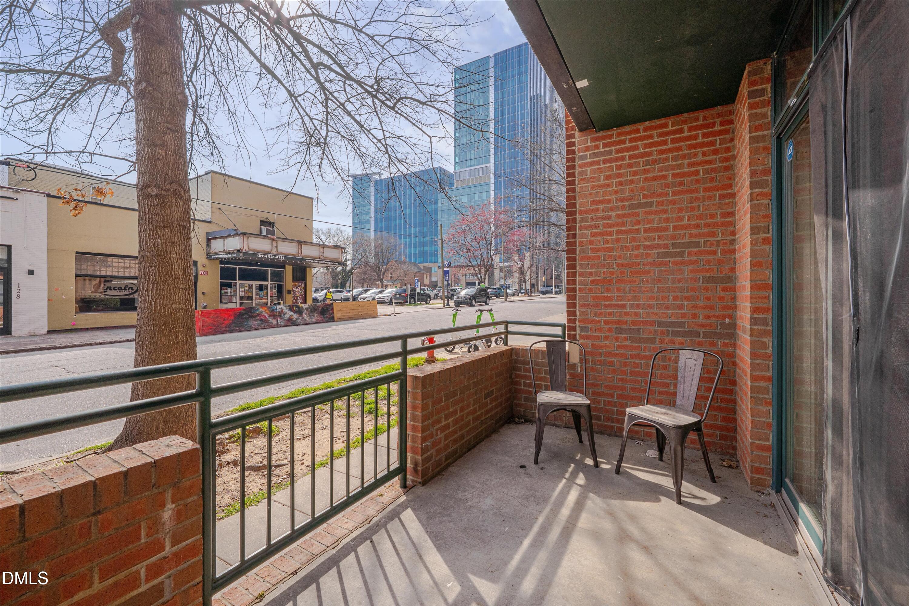 444 South Blount Street, Unit 120 Raleigh, NC 27601 - Photo 14 of 29 a view of a chairs with a outdoor seating