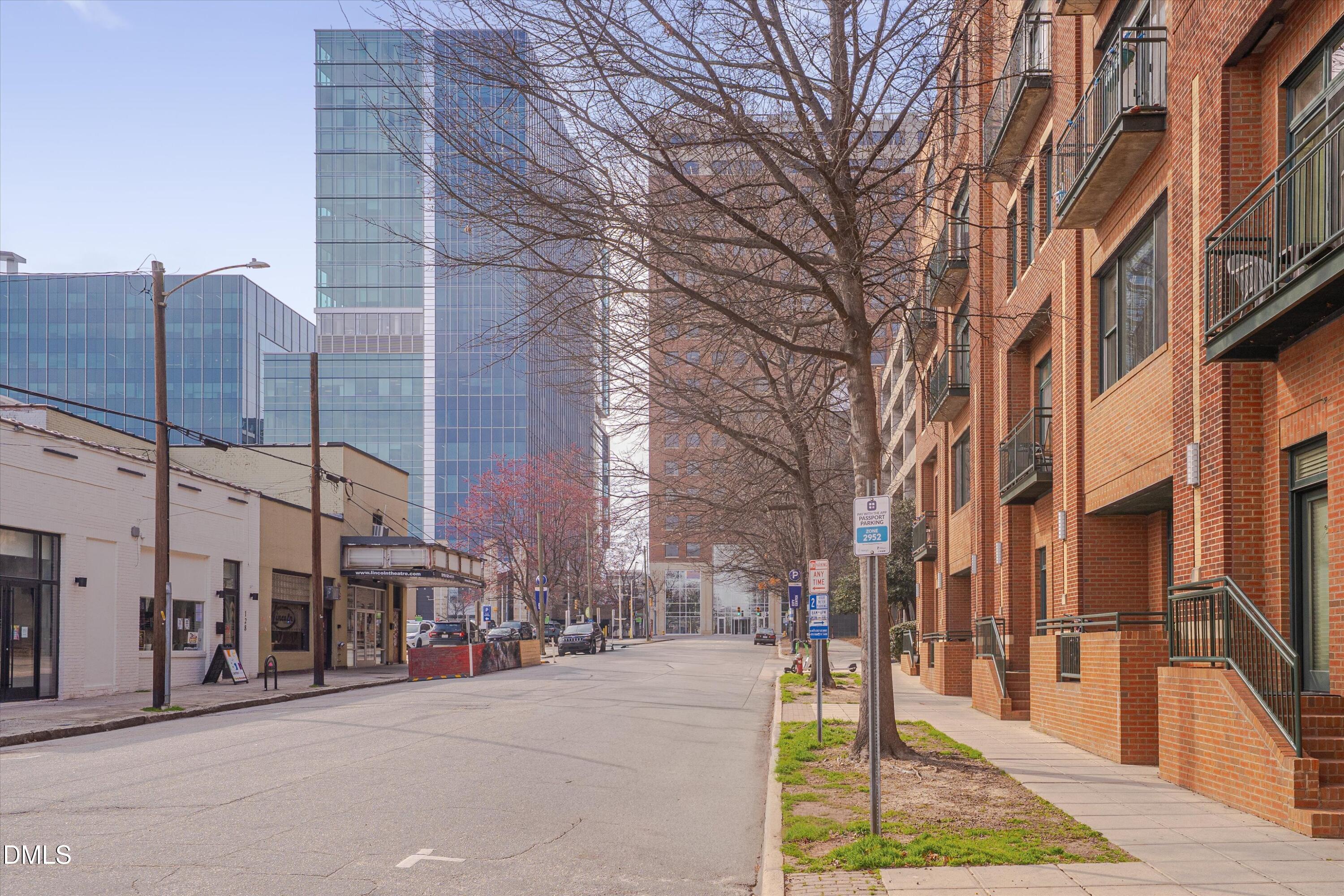 444 South Blount Street, Unit 120 Raleigh, NC 27601 - Photo 16 of 29 a city street lined with tall buildings