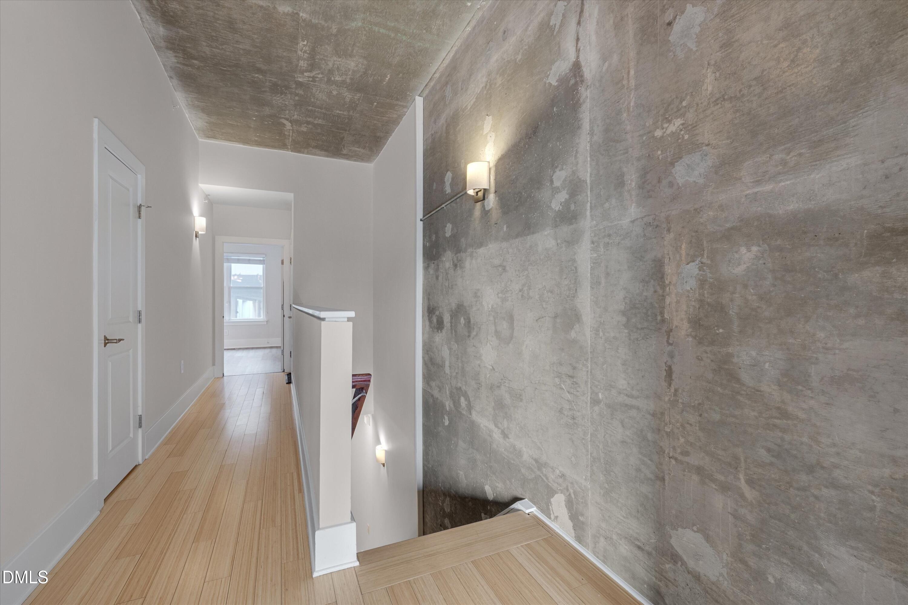 444 South Blount Street, Unit 120 Raleigh, NC 27601 - Photo 7 of 29 a bathroom with a sink and a mirror