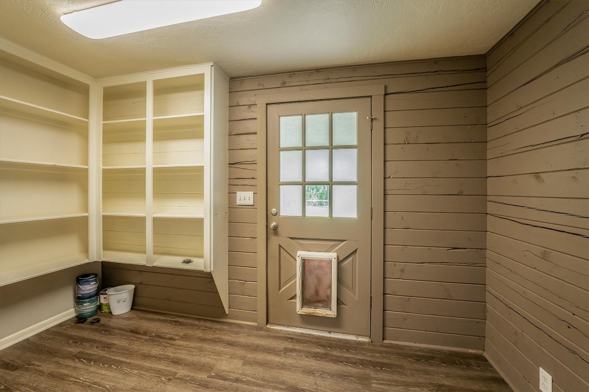 12049 Clark Lane Conroe, TX 77385 - Photo 15 of 40 a view of a room with wooden floor and windows