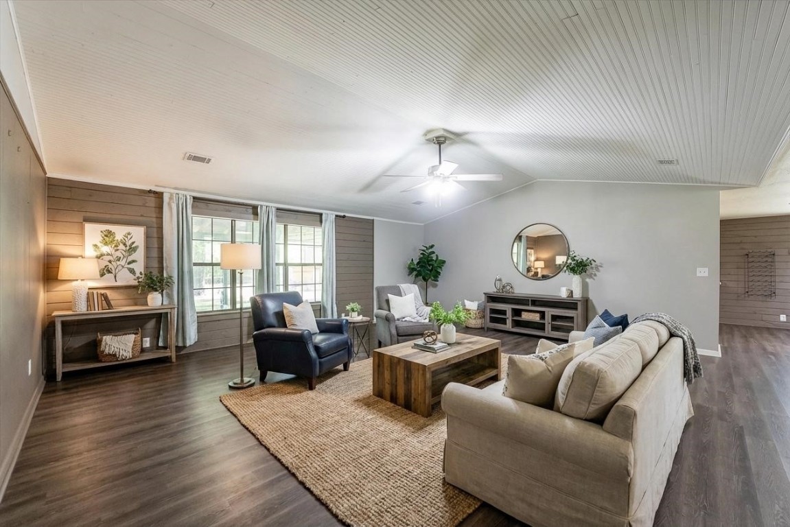 12049 Clark Lane Conroe, TX 77385 - Photo 16 of 40 a living room with furniture and wooden floor