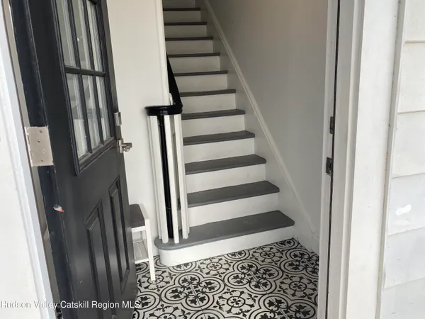 a view of entryway with a front door