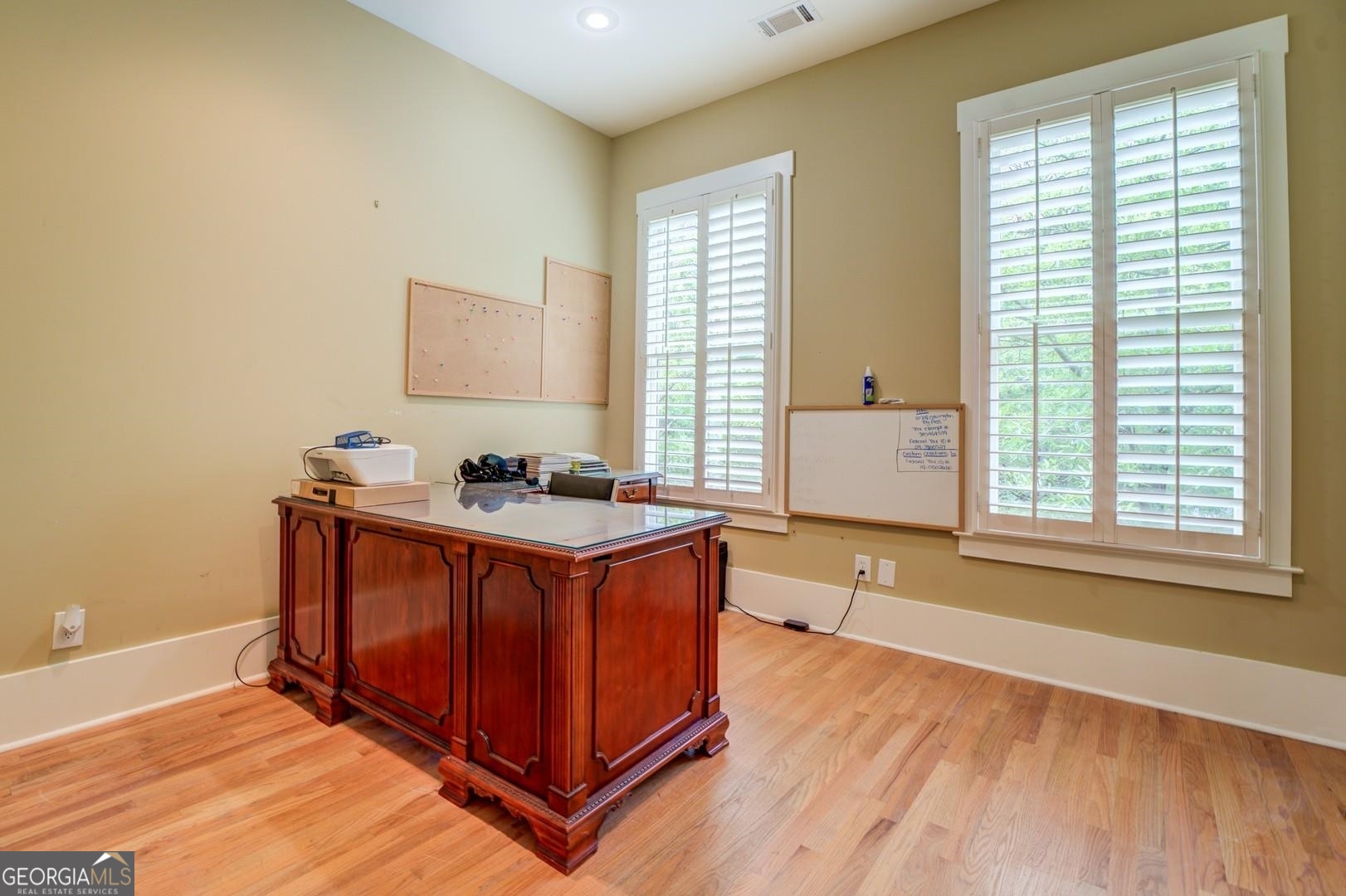 4165 Raphael Street Covington, GA 30014 - Photo 11 of 25 a spacious bathroom with double vanity and a mirror