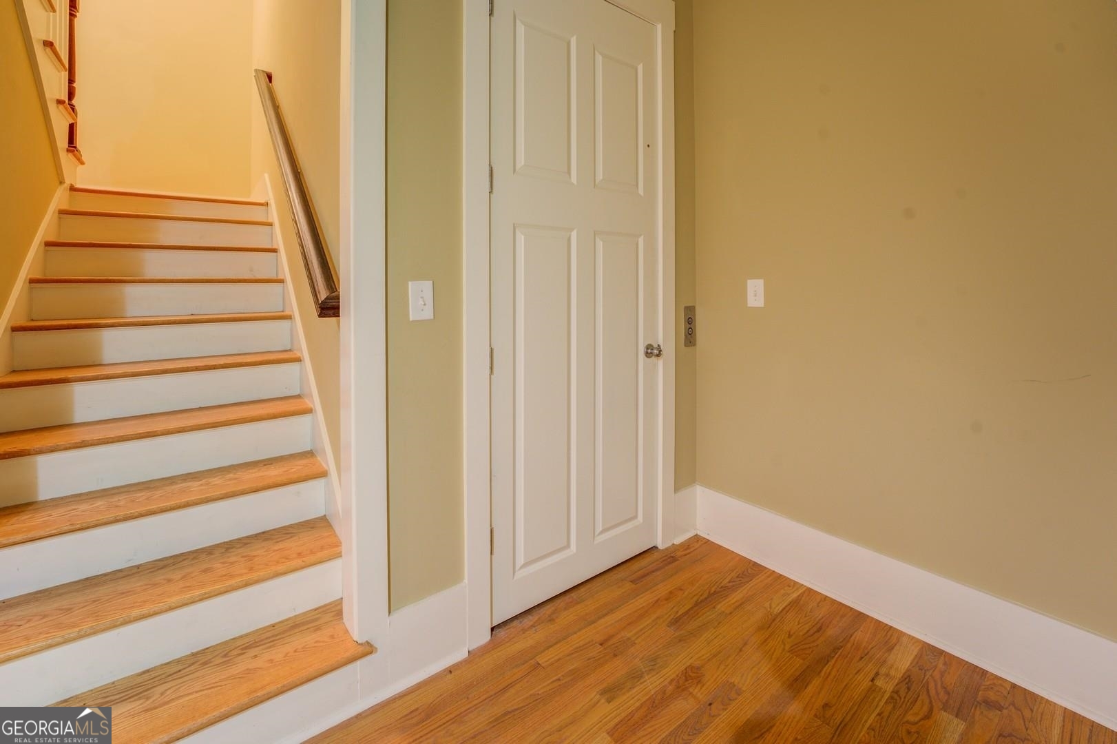 4165 Raphael Street Covington, GA 30014 - Photo 24 of 25 a view of entryway with wooden floor