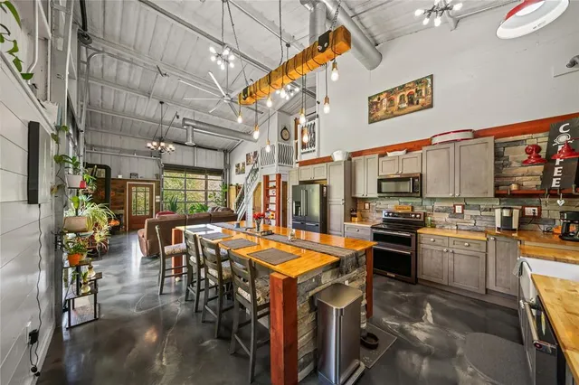 a view of a kitchen with furniture and a kitchen