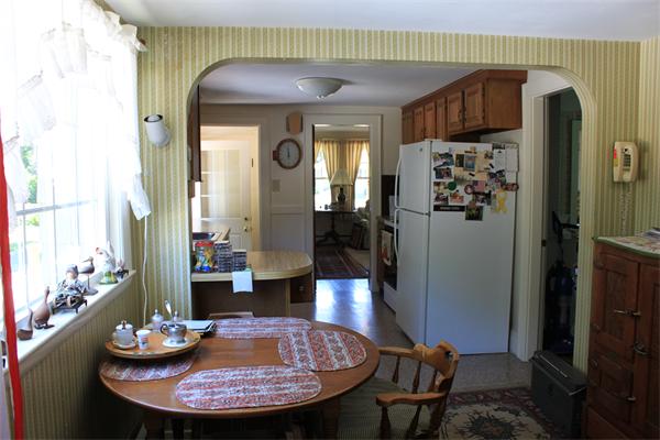 253 Lincoln Road Lincoln, MA 01773 - Photo 12 of 14 a view of a dining room with furniture