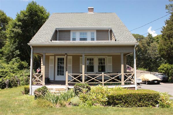 253 Lincoln Road Lincoln, MA 01773 - Photo 2 of 14 a house with trees in the background