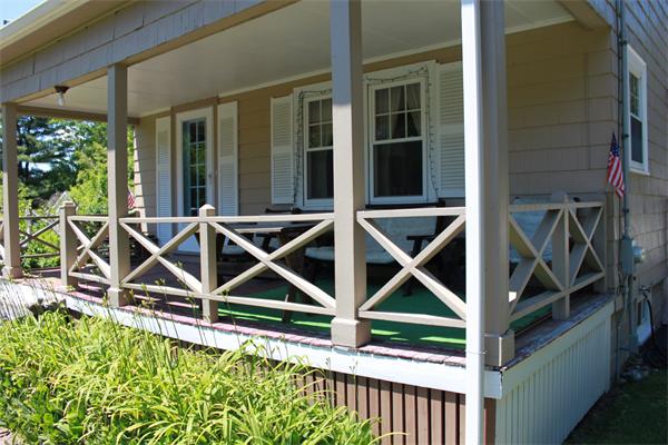 253 Lincoln Road Lincoln, MA 01773 - Photo 3 of 14 a view of house with wooden fence