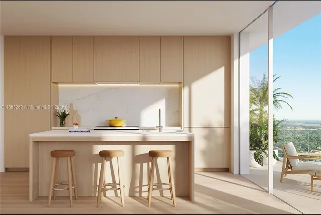 a kitchen with a stove and a refrigerator