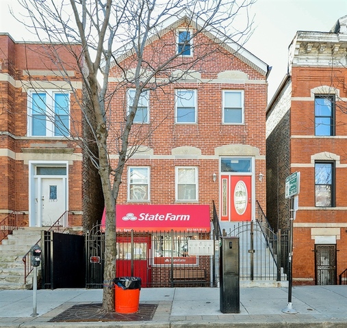 1631 West 18th Street, Unit 2 Chicago, IL 60608 - Photo 1 of 7 a street sign in a residential building
