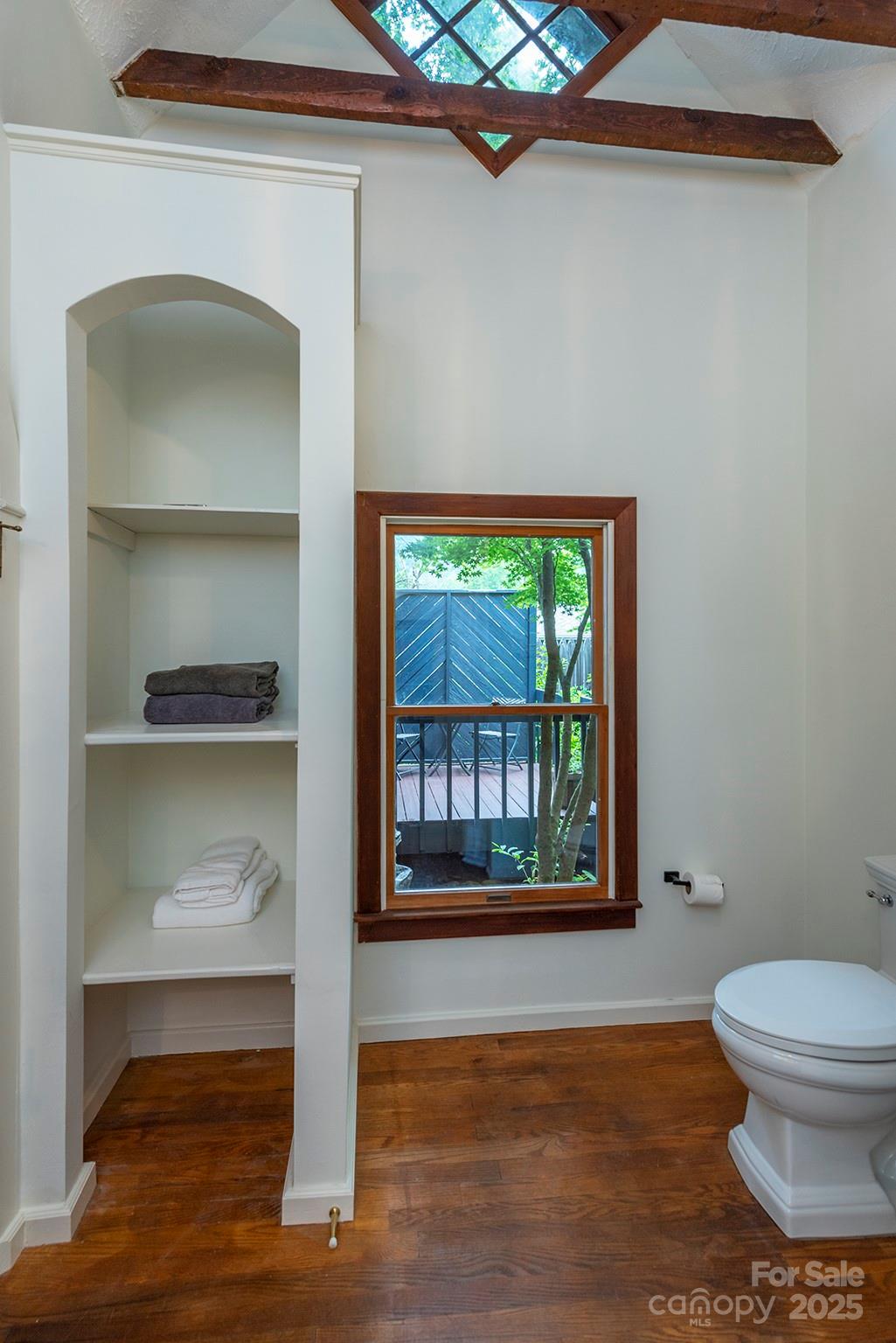 528 Padgettown Road Black Mountain, NC 28711 - Photo 15 of 43 a bathroom with a toilet and a window