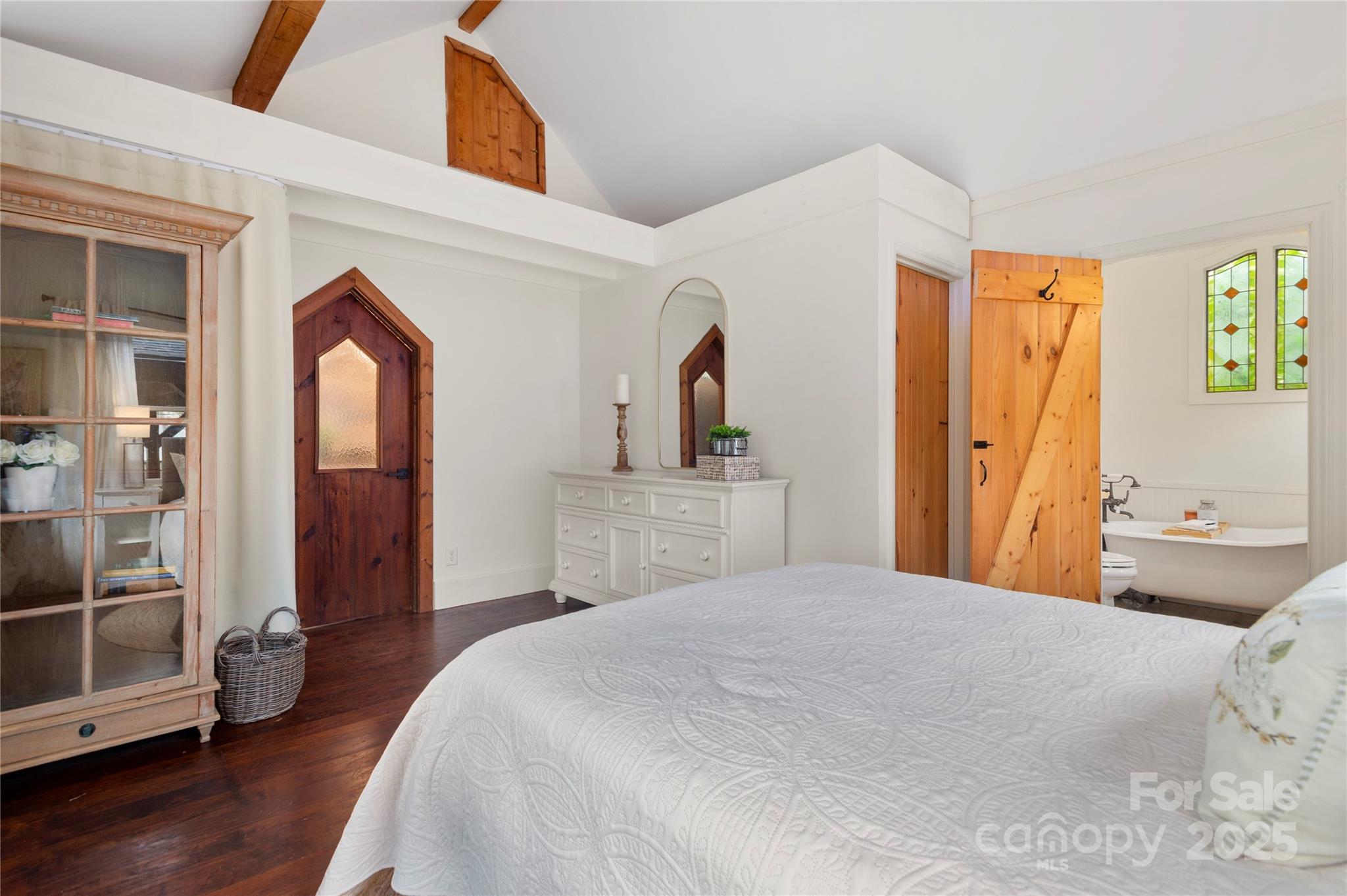 528 Padgettown Road Black Mountain, NC 28711 - Photo 19 of 43 a bedroom with a bed and a mirror