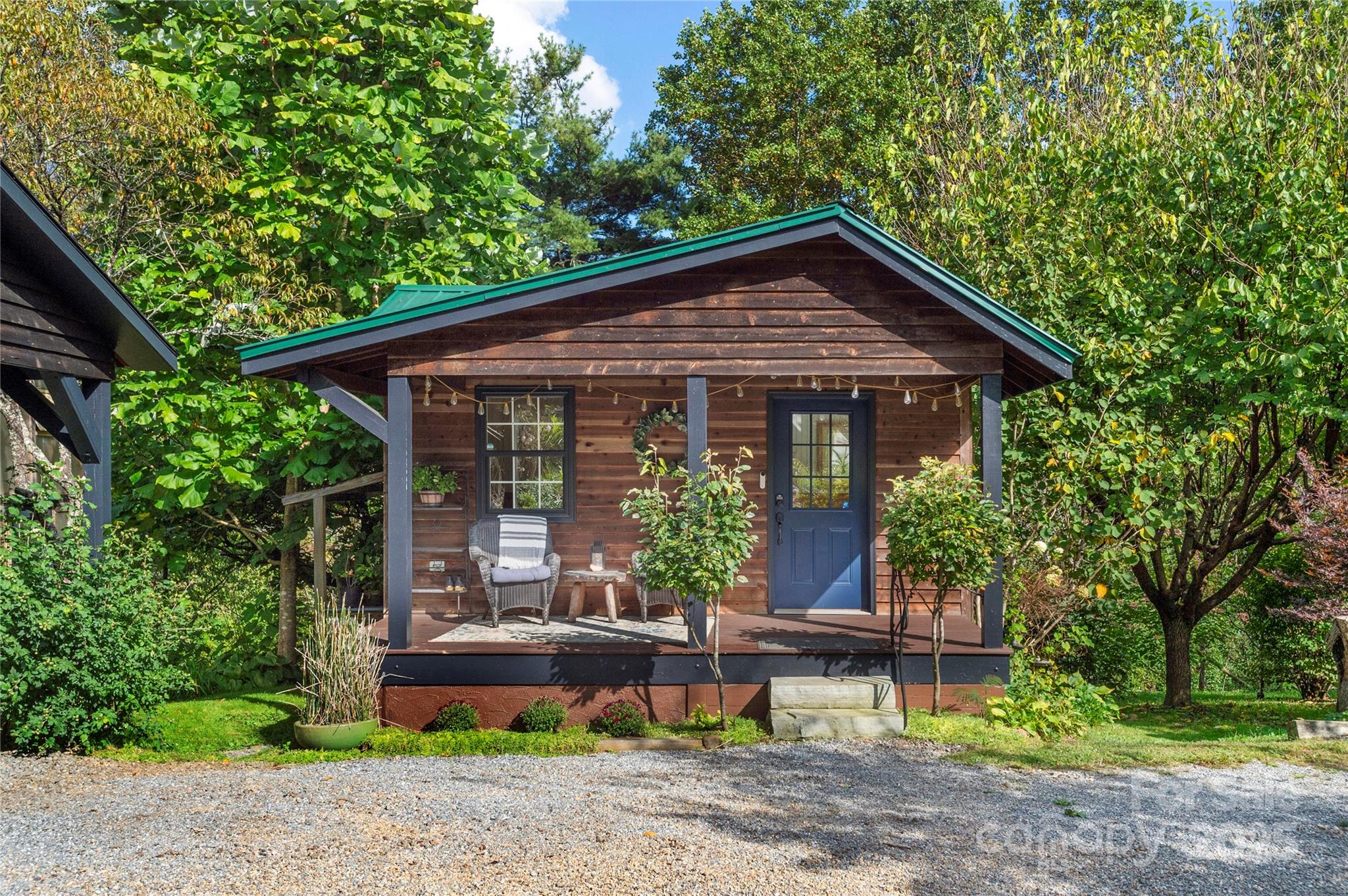 528 Padgettown Road Black Mountain, NC 28711 - Photo 21 of 43 a view of house with a yard and outdoor seating