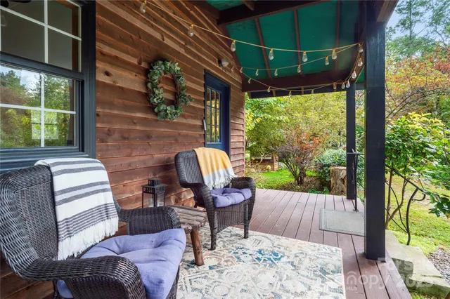 a view of a patio with a table chairs and a patio