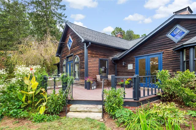 a front view of a house with glass windows